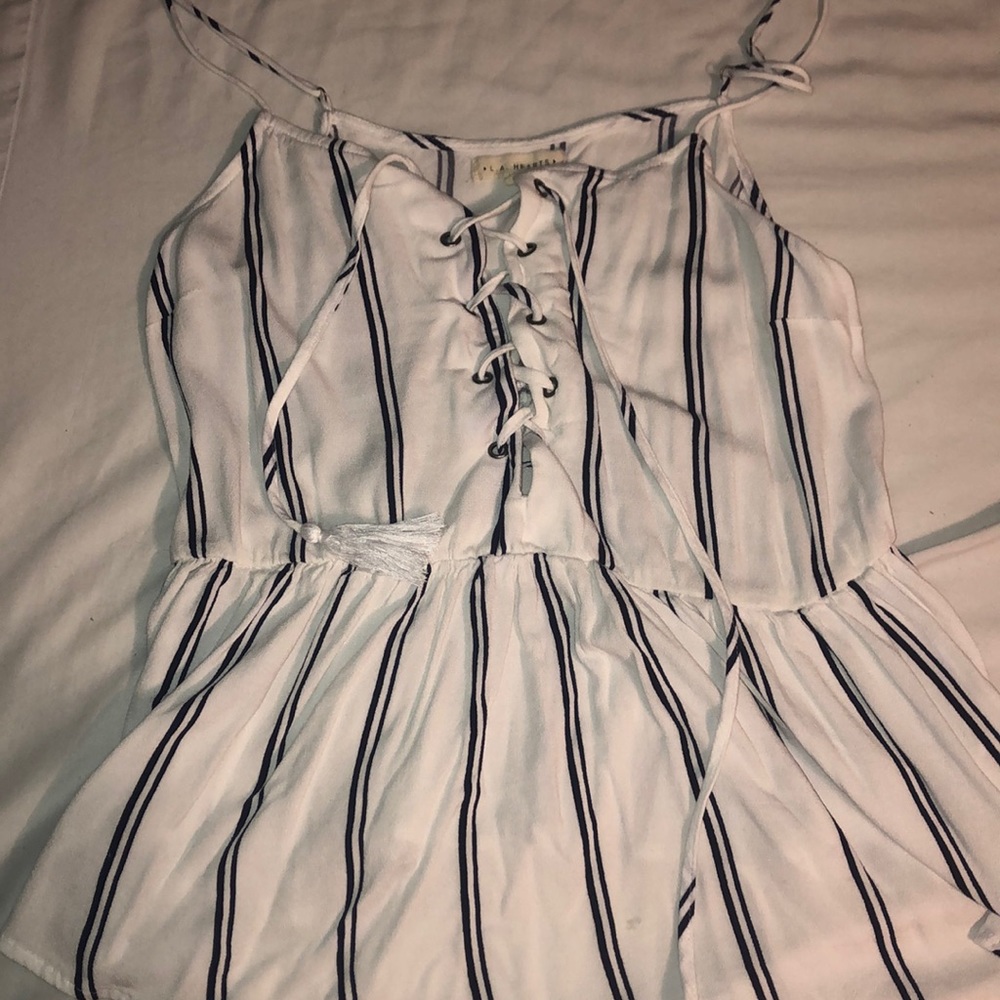 LIKE NEW Lace up peplum-style top from Pacsun